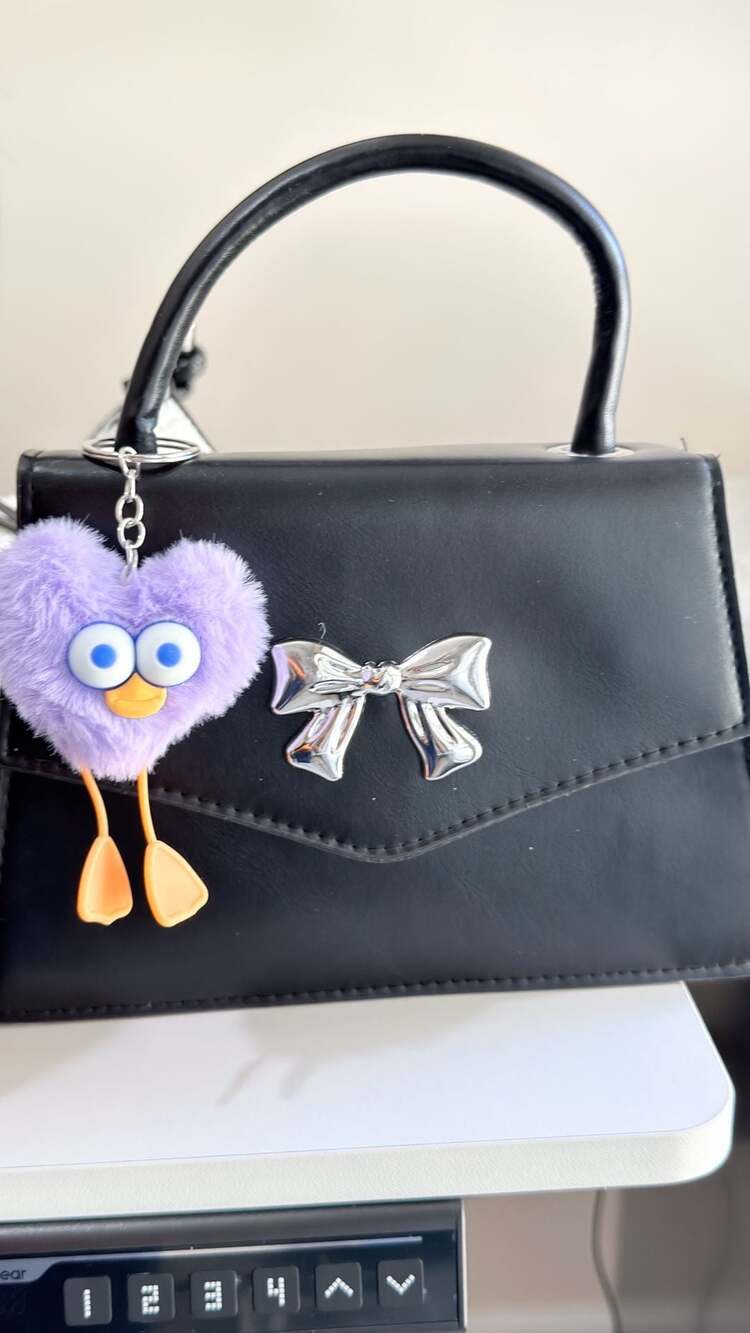 Minimalist Black Mini Square Handbag with Silver Bow Detail and Purple Heart Cha